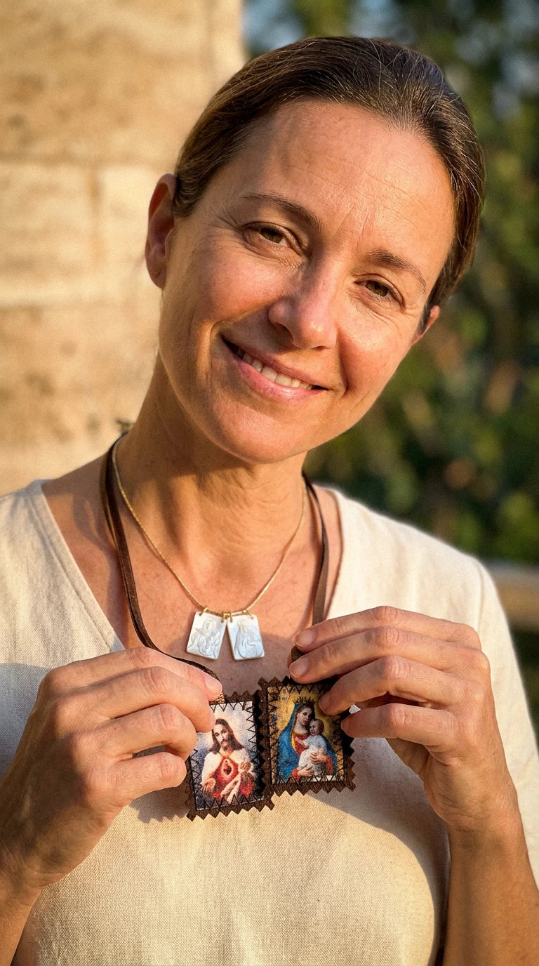 Wearing the mother of pearl scapular while holding the brown wool scapular